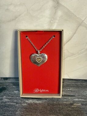 NWT Brighton “Love beyond words” necklace silver heart w/gold heart on it.